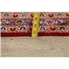 Image 11 : A WOOL HAND KNOTTED FLORAL ORIENTAL AREA RUG.