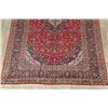 Image 5 : A WOOL HAND KNOTTED FLORAL ORIENTAL AREA RUG.