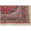 Image 6 : A WOOL HAND KNOTTED FLORAL ORIENTAL AREA RUG.