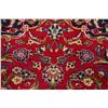 Image 8 : A WOOL HAND KNOTTED FLORAL ORIENTAL AREA RUG.