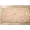 Image 9 : A WOOL HAND KNOTTED TURKISH AREA RUG.