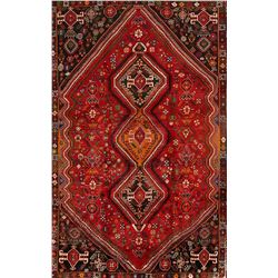A WOOL HAND KNOTTED ORIENTAL AREA RUG.