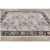 Image 11 : A WOOL HAND KNOTTED FLORAL ORIENTAL AREA RUG.