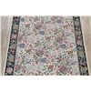 Image 12 : A WOOL HAND KNOTTED FLORAL ORIENTAL AREA RUG.