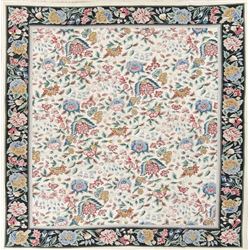 A WOOL HAND KNOTTED FLORAL ORIENTAL AREA RUG.
