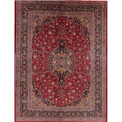 A WOOL HAND KNOTTED KASHMAR ORIENTAL AREA RUG.