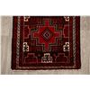 Image 5 : A WOOL HAND KNOTTED BALOUCH ORIENTAL RUG.