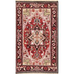 A WOOL HAND KNOTTED HERIZ ORIENTAL AREA RUG.