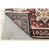 Image 10 : A WOOL HAND KNOTTED MEDALLION AREA RUG.