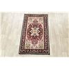 Image 2 : A WOOL HAND KNOTTED MEDALLION AREA RUG.