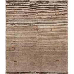 A WOOL HAND KNOTTED GABBEH ORIENTAL AREA RUG.