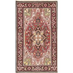 A WOOL HAND KNOTTED MEDALLION AREA RUG.