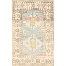 A WOOL HAND KNOTTED ANATOLIAN AREA RUG.