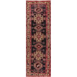 A WOOL HAND KNOTTED HALLWAY RUG RUNNER.