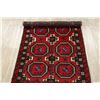 Image 11 : A WOOL HAND KNOTTED BALOUCH ORIENTAL AREA RUG.