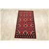 Image 2 : A WOOL HAND KNOTTED BALOUCH ORIENTAL AREA RUG.