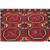 Image 9 : A WOOL HAND KNOTTED BALOUCH ORIENTAL AREA RUG.