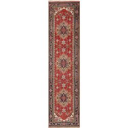 A WOOL HAND KNOTTED SERAPI ORIENTAL RUG RUNNER.