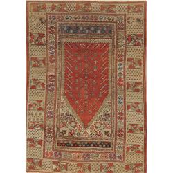 A WOOL HAND KNOTTED ANATOLIAN AREA RUG.