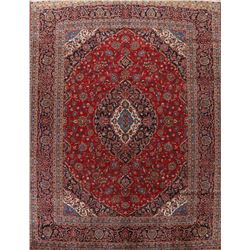 A WOOL HAND KNOTTED FLORAL ORIENTAL AREA RUG.