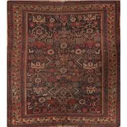 A WOOL HAND KNOTTED ORIENTAL AREA RUG.