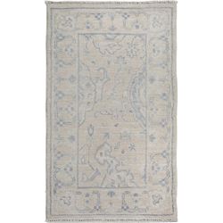 A WOOL HAND KNOTTED FLORAL ORIENTAL AREA RUG.