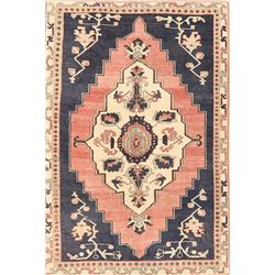 A WOOL HAND KNOTTED ANATOLIAN AREA RUG.