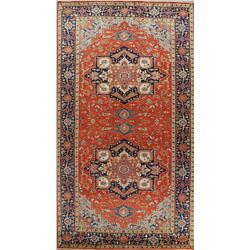 A WOOL HAND KNOTTED ORIENTAL AREA RUG.
