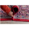 Image 12 : A WOOL HAND KNOTTED FLORAL ORIENTAL AREA RUG.
