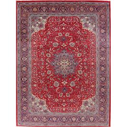 A WOOL HAND KNOTTED FLORAL ORIENTAL AREA RUG.