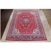 Image 2 : A WOOL HAND KNOTTED FLORAL ORIENTAL AREA RUG.