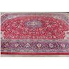Image 9 : A WOOL HAND KNOTTED FLORAL ORIENTAL AREA RUG.