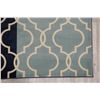 Image 6 : A WOOL HAND KNOTTED TURKISH AREA RUG.