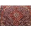 Image 4 : A WOOL HAND KNOTTED ORIENTAL AREA RUG.