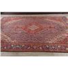 Image 9 : A WOOL HAND KNOTTED ORIENTAL AREA RUG.