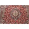 Image 4 : A WOOL HAND KNOTTED FLORAL ORIENTAL AREA RUG.