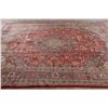 Image 9 : A WOOL HAND KNOTTED FLORAL ORIENTAL AREA RUG.