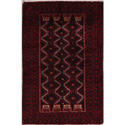 A WOOL HAND KNOTTED BALOUCH AREA RUG.