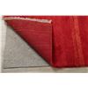 Image 10 : A WOOL HAND KNOTTED GABBEH AREA RUG.