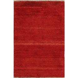 A WOOL HAND KNOTTED GABBEH AREA RUG.