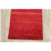 Image 5 : A WOOL HAND KNOTTED GABBEH AREA RUG.