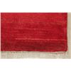 Image 6 : A WOOL HAND KNOTTED GABBEH AREA RUG.