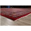 Image 10 : A WOOL HAND KNOTTED FLORAL MEDALLION AREA RUG.