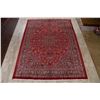 Image 2 : A WOOL HAND KNOTTED FLORAL MEDALLION AREA RUG.