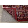 Image 9 : A WOOL HAND KNOTTED FLORAL MEDALLION AREA RUG.