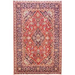 A WOOL HAND KNOTTED ARDAKAN ORIENTAL AREA RUG.