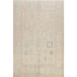A WOOL HAND KNOTTED OUSHAK TURKISH AREA RUG.