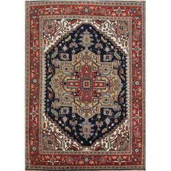 A WOOL HAND KNOTTED SERAPI ORIENTAL AREA RUG.