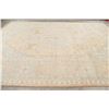 Image 9 : A WOOL HAND KNOTTED FLORAL OUSHAK AREA RUG.
