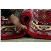 Image 12 : A WOOL HAND KNOTTED FLORAL ORIENTAL AREA RUG.